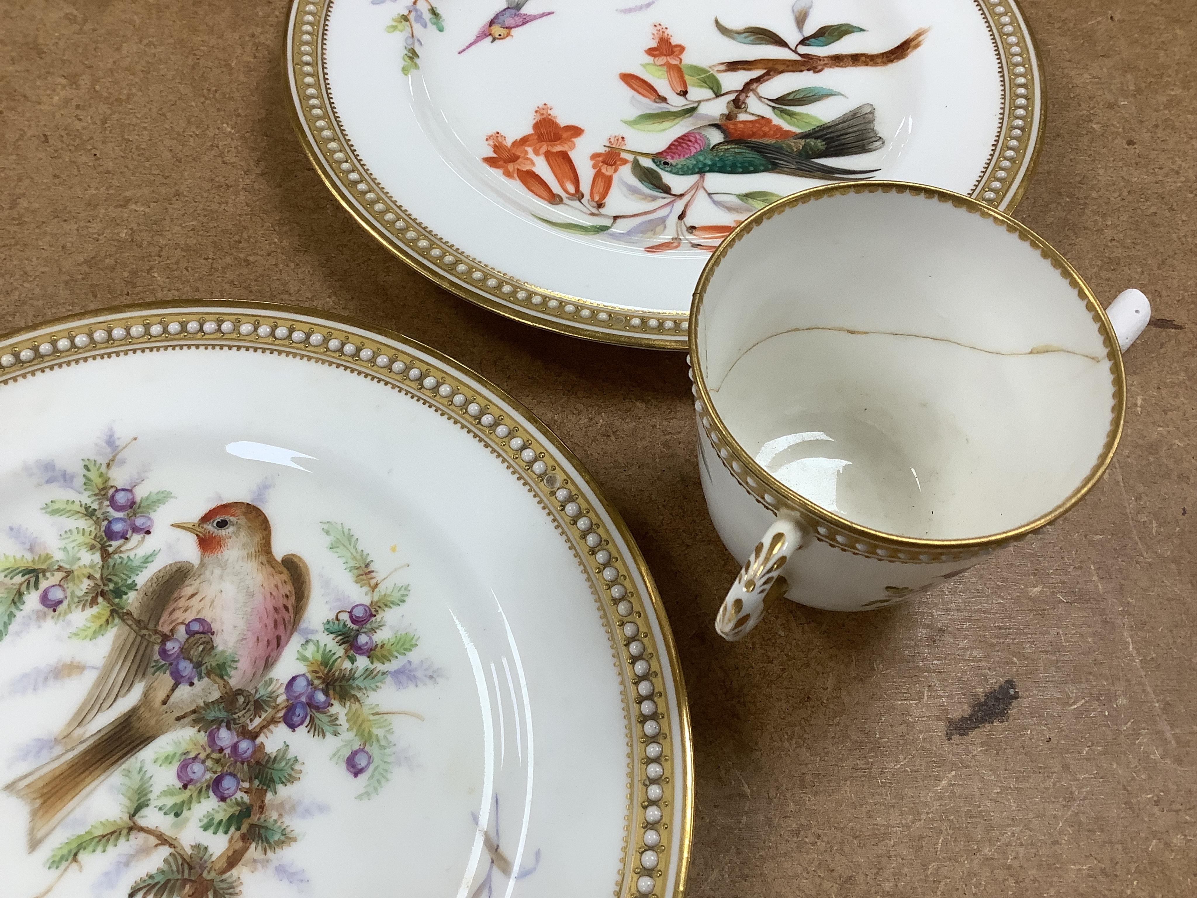 A 19th century Royal Worcester ornithologically decorated part tea set, with gilt and jewelled edges, six place setting. Condition - good